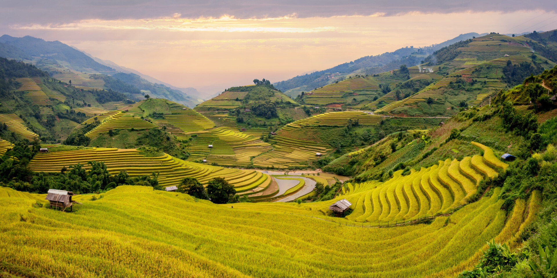 Buildings made with local wood, stone, and bamboo, reflecting sustainable tourism principles