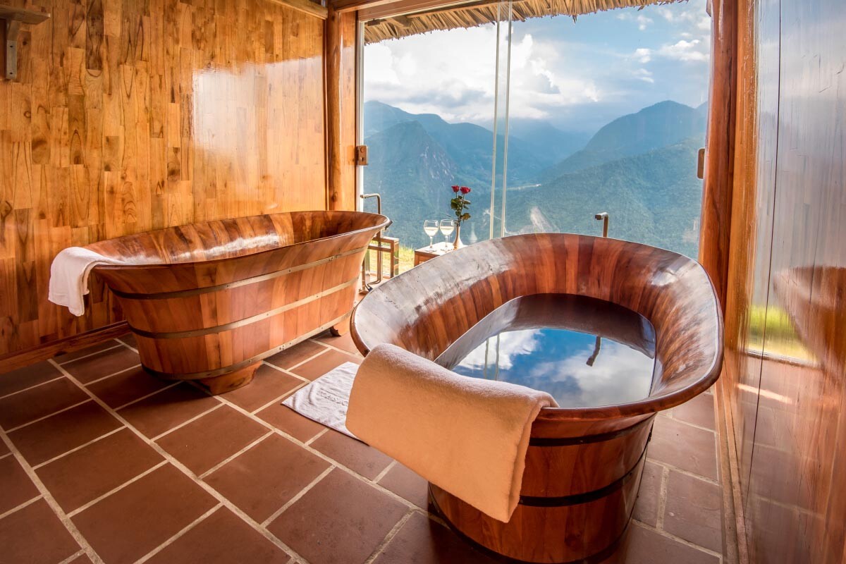 Sapa spa therapist applying herbal treatments inspired by nature