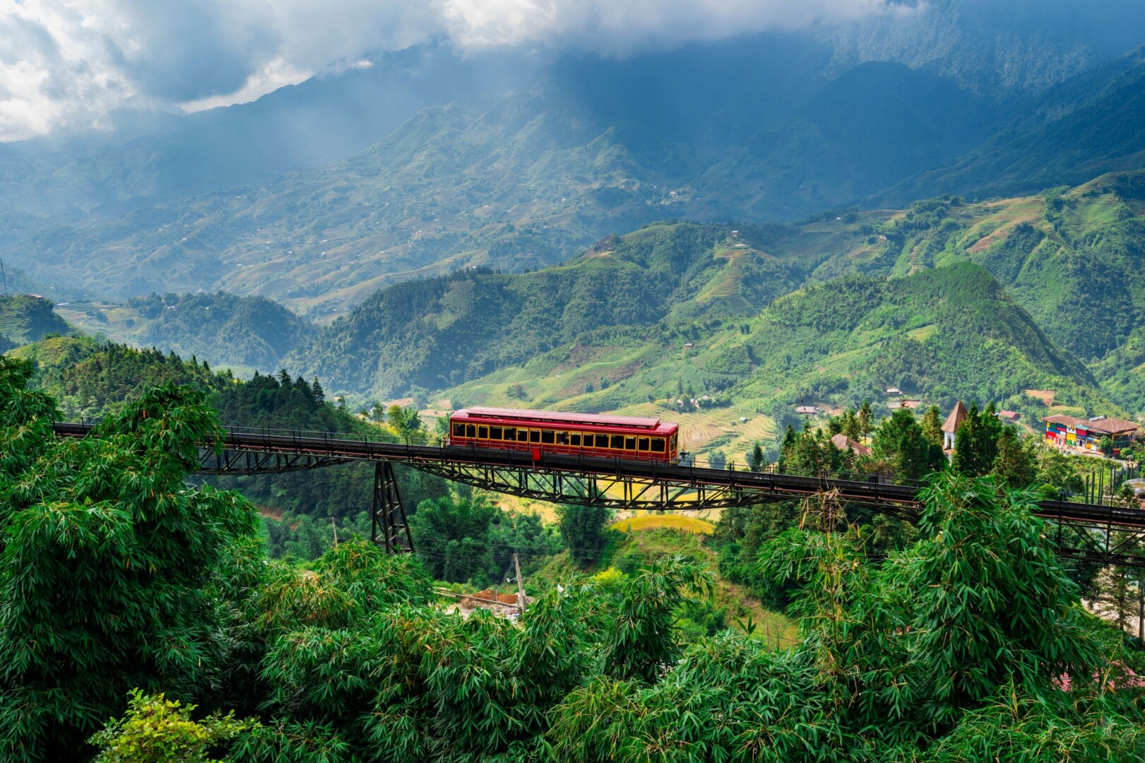 Muong Hoa mountain train passing through misty valleys of Sapa