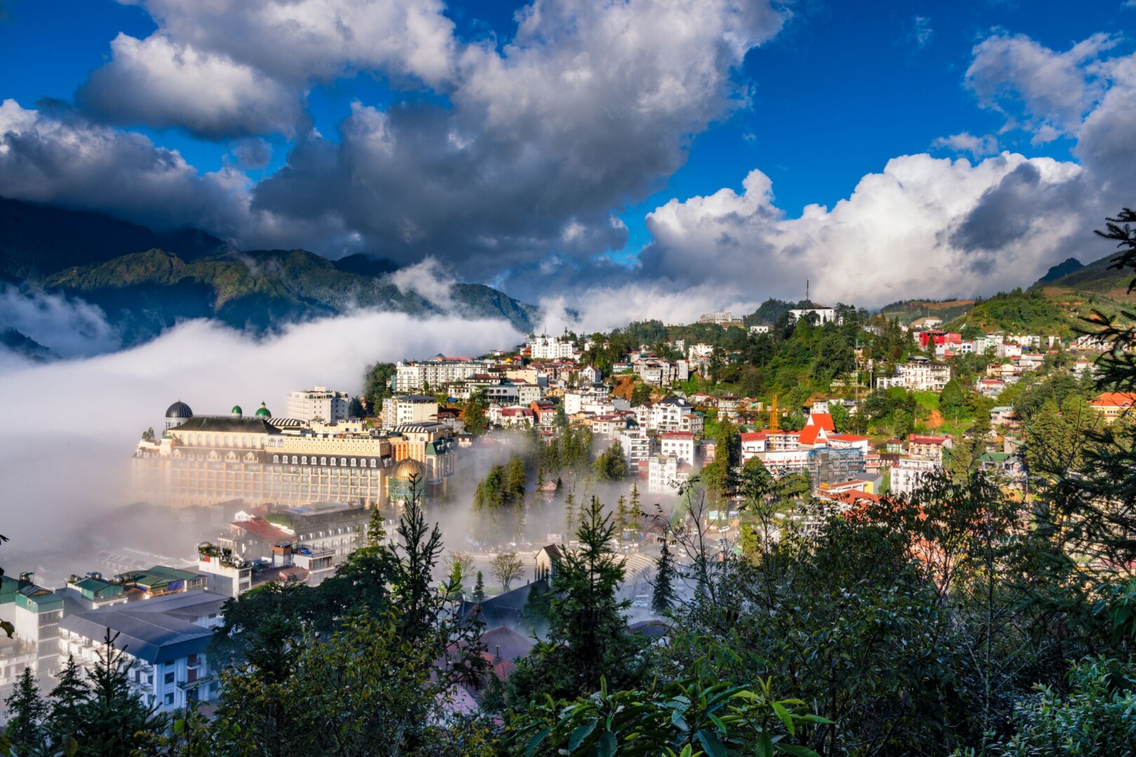 Majestic Sapa landscapes with mountains, valleys and clouds near Belle Maison Sapa Resort & Spa