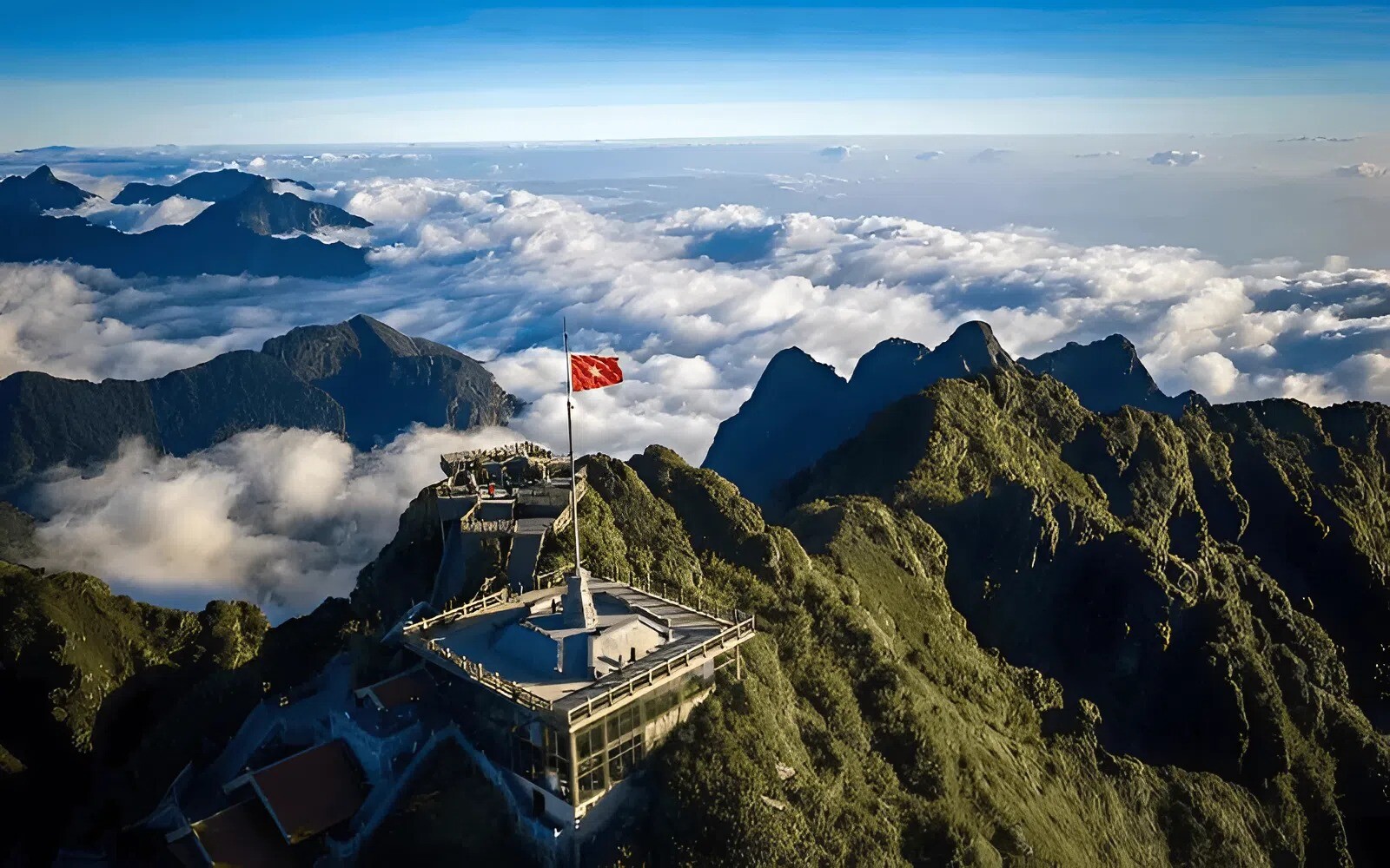 Standing On The Summit Of Fansipan, The Roof Of Indochina, Surrounded By Endless Clouds